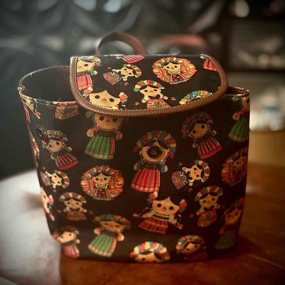 Black Patterned Women’s Backpack with Colorful Folk Doll Print
